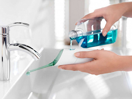 Zobstarpu tīrītājs AirFloss HX8211/02